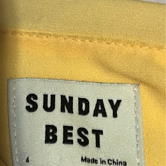 Aritzia wrap dress with flattering ruffle edging. Size 6 in butter yellow - Picture 5 of 6